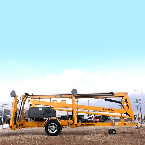 An Articulating Towable Boom Lift parked